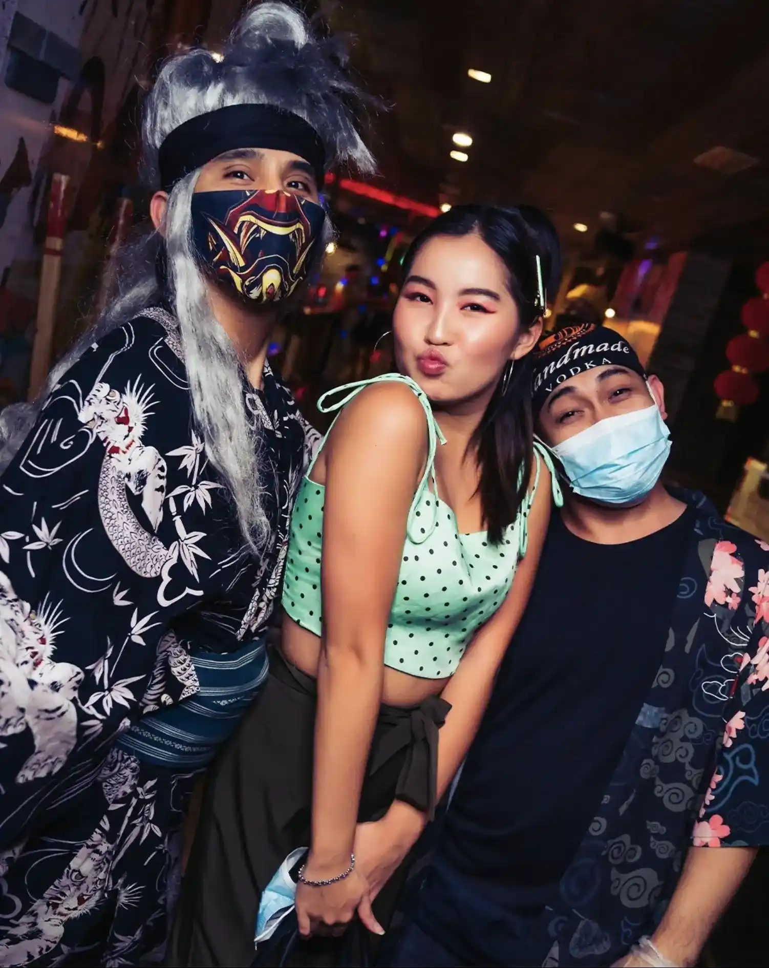 three people in costume